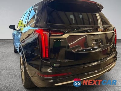 Trzecie zdjęcie samochodu z tyłu: 2022 CADILLAC XT6 PREMIUM LUXURY VIN:1GYKPCRS0NZ105757 - miniatura