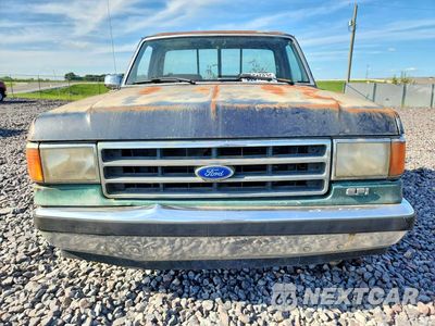 Piąte zdjęcie samochodu w środku: 1988 FORD F150 VIN:1FTEF15N3JNA22836 - miniatura