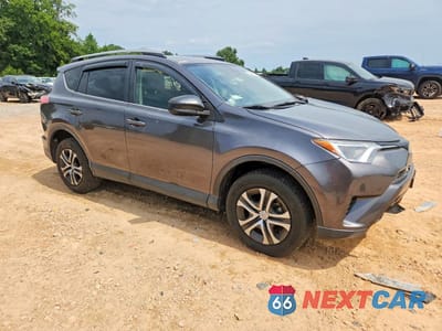 Czwarte zdjęcie samochodu z boku: 2017 TOYOTA RAV4 LE VIN:JTMZFREV9HJ711507 - miniatura