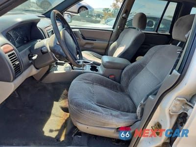 Zdjęcie 7 z 13 samochodu: 1999 JEEP GRAND CHEROKEE LAREDO VIN:1J4GW58S9XC682248 - miniatura