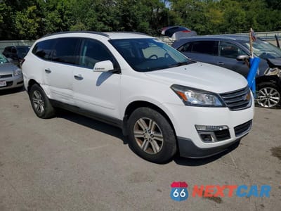 Czwarte zdjęcie samochodu z boku: 2016 CHEVROLET TRAVERSE LT VIN:1GNKVGKD6GJ234514 - miniatura