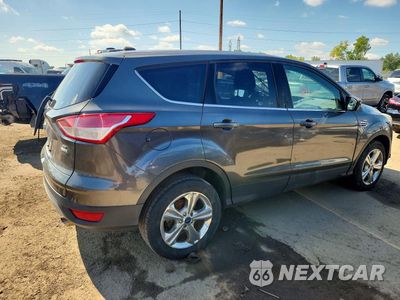 Trzecie zdjęcie samochodu z tyłu: 2016 FORD ESCAPE SE VIN:1FMCU9GX2GUC82696 - miniatura