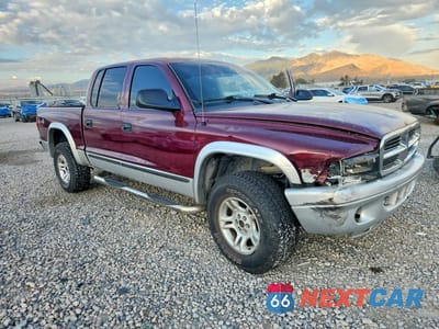 Czwarte zdjęcie samochodu z boku: 2003 DODGE DAKOTA QUAD SLT VIN:1D7HG48N23S204755 - miniatura