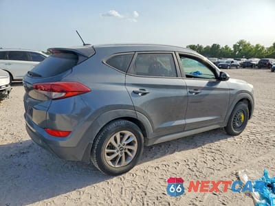 Trzecie zdjęcie samochodu z tyłu: 2017 HYUNDAI TUCSON SE VIN:KM8J33A44HU266166 - miniatura
