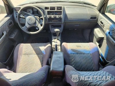 Zdjęcie 8 z 12 samochodu: 1999 TOYOTA RAV4 BASE VIN:JT3GP10V9X7059940 - miniatura