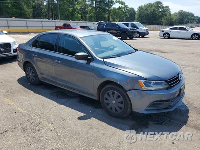 Czwarte zdjęcie samochodu z boku: 2015 VOLKSWAGEN JETTA BASE VIN:3VW2K7AJ2FM417013 - miniatura