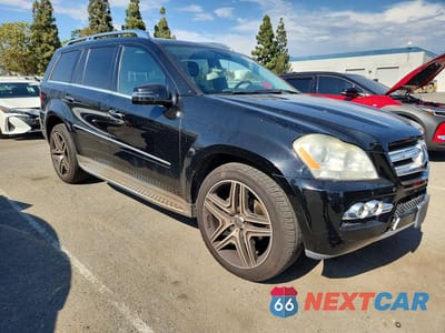 Czwarte zdjęcie samochodu z boku: 2011 MERCEDES-BENZ GL 450 4MATIC VIN:4JGBF7BE2BA692263 - miniatura