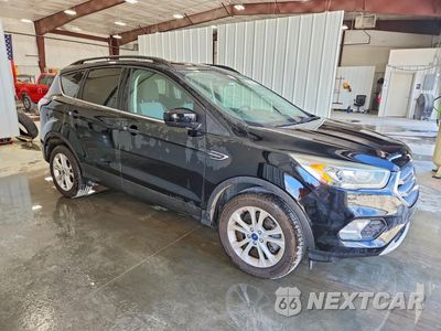 Czwarte zdjęcie samochodu z boku: 2017 FORD ESCAPE SE VIN:1FMCU9GD2HUC00926 - miniatura