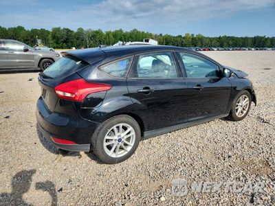 Trzecie zdjęcie samochodu z tyłu: 2017 FORD FOCUS SE VIN:1FADP3K27HL293537 - miniatura