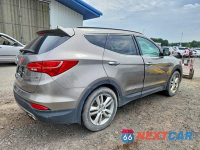 Trzecie zdjęcie samochodu z tyłu: 2014 HYUNDAI SANTA FE SPORT 2.0T VIN:5XYZWDLA2EG219187 - miniatura