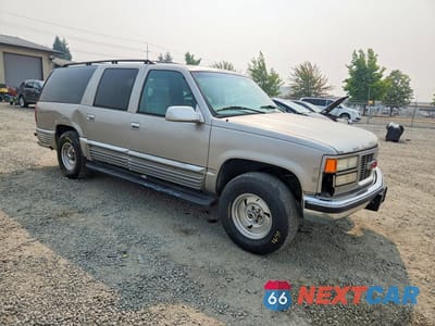 Czwarte zdjęcie samochodu z boku: 1998 GMC SUBURBAN K1500 VIN:1GKFK16R1WJ705431 - miniatura