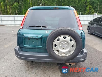Zdjęcie 6 z 13 samochodu: 1999 HONDA CR-V LX VIN:JHLRD1844XC002757 - miniatura