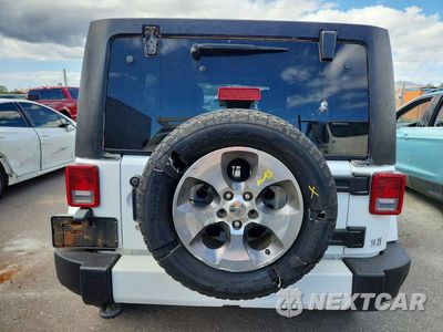 Zdjęcie 6 z 13 samochodu: 2016 JEEP WRANGLER UNLIMITED SAHARA VIN:1C4BJWEG5GL234030 - miniatura