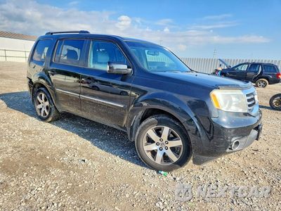 Czwarte zdjęcie samochodu z boku: 2012 HONDA PILOT TOURING VIN:5FNYF4H96CB086688 - miniatura
