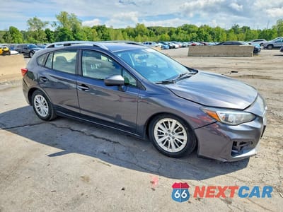 Czwarte zdjęcie samochodu z boku: 2018 SUBARU IMPREZA PREMIUM VIN:4S3GTAB61J3721005 - miniatura