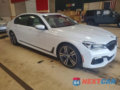 Czwarte zdjęcie samochodu z boku: 2019 BMW 750 I VIN:WBA7F0C58KGM25235 - miniatura