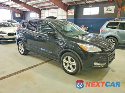 Czwarte zdjęcie samochodu z boku: 2015 FORD ESCAPE SE VIN:1FMCU9G90FUB32442 - miniatura