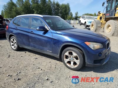 Czwarte zdjęcie samochodu z boku: 2013 BMW X1 SDRIVE28I VIN:WBAVM1C54DVW44453 - miniatura