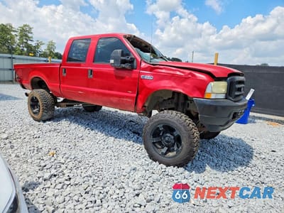 Czwarte zdjęcie samochodu z boku: 2002 FORD F350 SRW SUPER DUTY VIN:1FTSW31F32ED43774 - miniatura