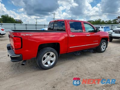 Trzecie zdjęcie samochodu z tyłu: 2014 CHEVROLET SILVERADO K1500 LTZ VIN:3GCUKSEC2EG545100 - miniatura