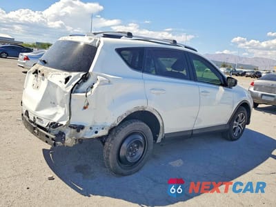Trzecie zdjęcie samochodu z tyłu: 2016 TOYOTA RAV4 LE VIN:JTMZFREV5GJ098476 - miniatura