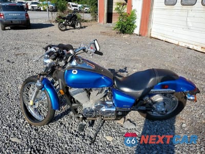 Trzecie zdjęcie samochodu z tyłu: 2007 HONDA VT750 C2 VIN:JH2RC53037M001886 - miniatura