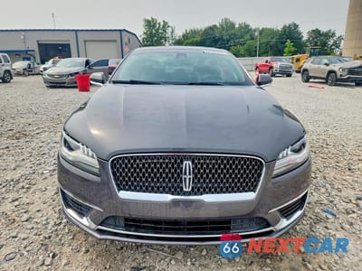 Piąte zdjęcie samochodu w środku: 2018 LINCOLN MKZ RESERVE VIN:3LN6L5F99JR602073 - miniatura