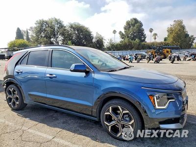 Czwarte zdjęcie samochodu z boku: 2023 KIA NIRO SX TOURING VIN:KNDCR3LFXP5074270 - miniatura