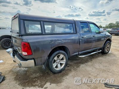 Trzecie zdjęcie samochodu z tyłu: 2014 RAM 1500 SLT VIN:1C6RR7GT2ES393055 - miniatura