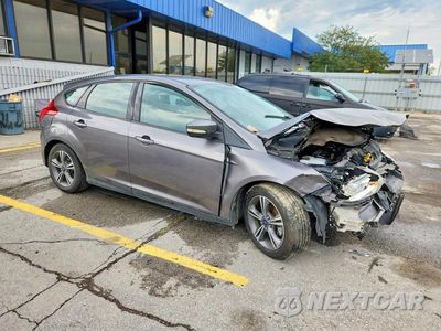 Czwarte zdjęcie samochodu z boku: 2014 FORD FOCUS SE VIN:1FADP3K25EL317054 - miniatura