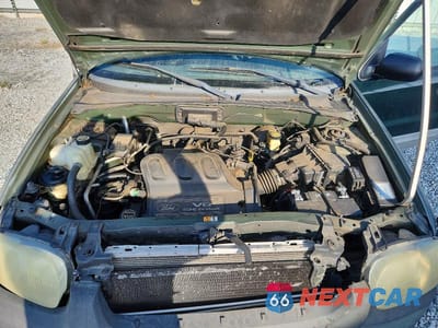 Zdjęcie 12 z 13 samochodu: 2002 FORD ESCAPE XLT VIN:1FMYU03182KE08700 - miniatura