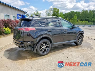 Trzecie zdjęcie samochodu z tyłu: 2016 TOYOTA RAV4 SE VIN:2T3JFREV1GW452489 - miniatura