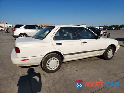 Trzecie zdjęcie samochodu z tyłu: 1994 NISSAN SENTRA E VIN:JN1EB31P5RU336927 - miniatura
