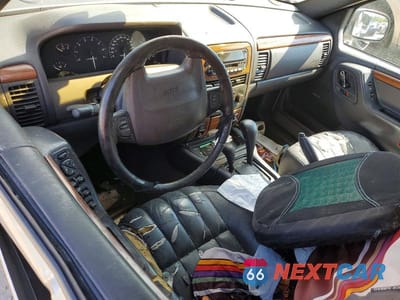 Zdjęcie 8 z 14 samochodu: 1999 JEEP GRAND CHEROKEE LIMITED VIN:1J4GW68N5XC547087 - miniatura