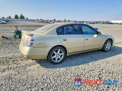 Trzecie zdjęcie samochodu z tyłu: 2002 NISSAN ALTIMA 3.5 SE VIN:1N4BL11E72C129036 - miniatura