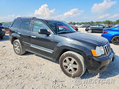 Czwarte zdjęcie samochodu z boku: 2010 JEEP GRAND CHEROKEE LAREDO VIN:1J4RR4GT0AC146185 - miniatura