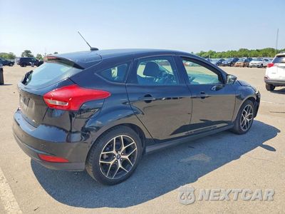 Trzecie zdjęcie samochodu z tyłu: 2017 FORD FOCUS SEL VIN:1FADP3M21HL311401 - miniatura