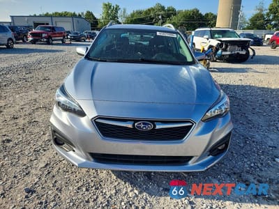 Piąte zdjęcie samochodu w środku: 2018 SUBARU IMPREZA PREMIUM PLUS VIN:4S3GTAD60J3717993 - miniatura