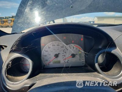 Zdjęcie 9 z 12 samochodu: 2001 MITSUBISHI ECLIPSE SPYDER GT VIN:4A3AE55H71E004114 - miniatura