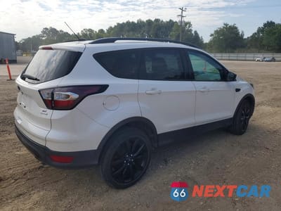 Trzecie zdjęcie samochodu z tyłu: 2017 FORD ESCAPE SE VIN:1FMCU0G92HUB95900 - miniatura