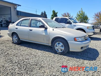 Czwarte zdjęcie samochodu z boku: 1999 NISSAN SENTRA XE VIN:1N4AB41D4XC729673 - miniatura