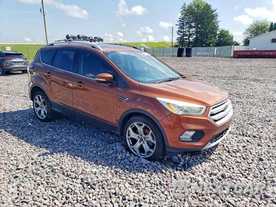 Czwarte zdjęcie samochodu z boku: 2017 FORD ESCAPE TITANIUM VIN:1FMCU9J93HUA74726 - miniatura