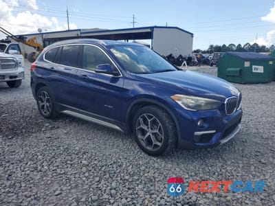 Czwarte zdjęcie samochodu z boku: 2017 BMW X1 XDRIVE28I VIN:WBXHT3C33H5F69771 - miniatura