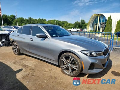 Czwarte zdjęcie samochodu z boku: 2024 BMW 330XI VIN:3MW89FF09R8E26711 - miniatura