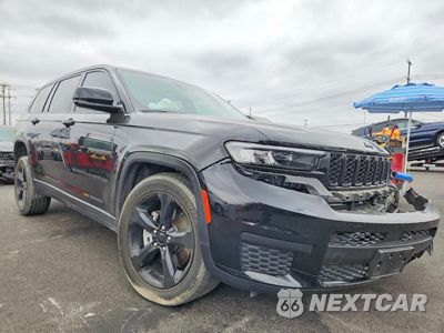 Czwarte zdjęcie samochodu z boku: 2023 JEEP GRAND CHEROKEE L LAREDO VIN:1C4RJKAG9P8899206 - miniatura