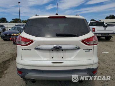 Zdjęcie 6 z 13 samochodu: 2014 FORD ESCAPE TITANIUM VIN:1FMCU9J97EUA92125 - miniatura