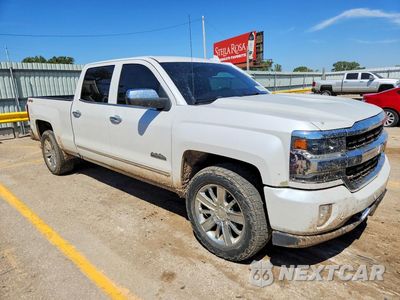 Czwarte zdjęcie samochodu z boku: 2018 CHEVROLET SILVERADO K1500 HIGH COUNTRY VIN:3GCUKTEJ9JG575533 - miniatura