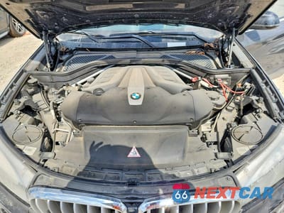 Zdjęcie 12 z 13 samochodu: 2014 BMW X5 XDRIVE50I VIN:5UXKR6C5XE0C02264 - miniatura