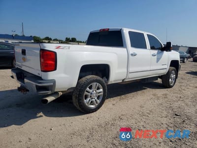 Trzecie zdjęcie samochodu z tyłu: 2016 CHEVROLET SILVERADO K2500 HEAVY DUTY LTZ VIN:1GC1KWE8XGF301754 - miniatura