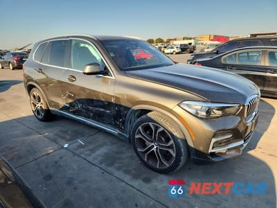 Czwarte zdjęcie samochodu z boku: 2022 BMW X5 XDRIVE40I VIN:5UXCR6C0XN9M82155 - miniatura